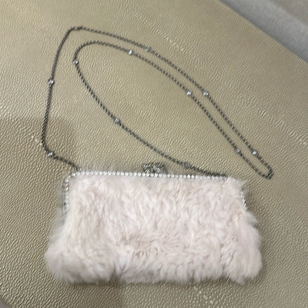Stunning white fur mini bag with rhinestone embellishments in perfect condition.